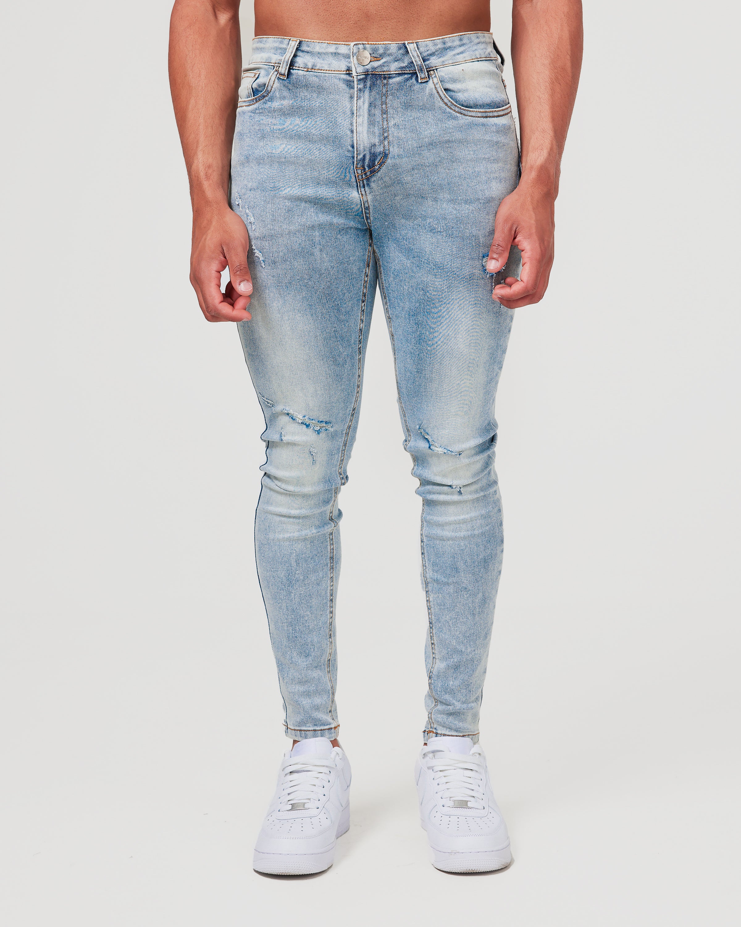 Faded Blue Ripped Jeans