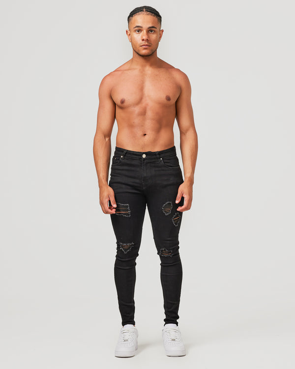 Front of black ripped jeans for men