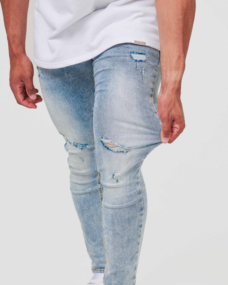 Faded Blue Ripped Jeans