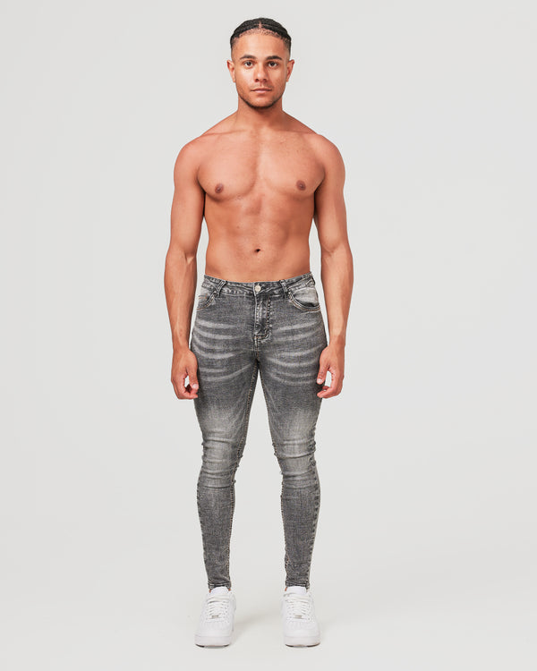 Front of faded grey mens jeans