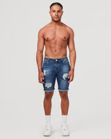 Front of dark blue ripped shorts