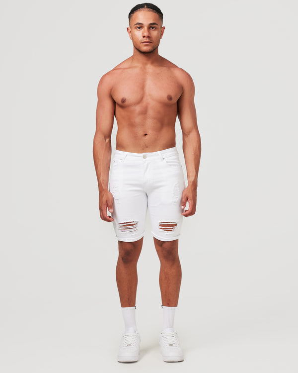 Front of white ripped denim shorts for men