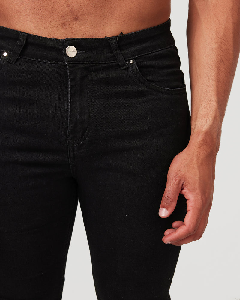 Black Destroyed Knee Jeans – la haute couture
