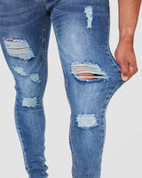 Stretching Blue Ripped Jeans